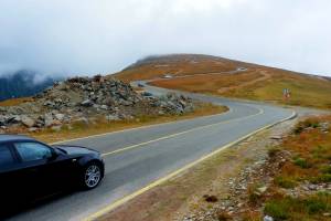Picture of a car traveling along the Transalpina Road in Romania